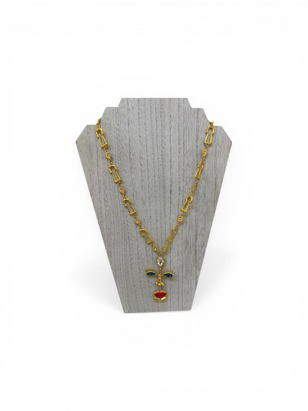 Collar artístico con dije de rostro