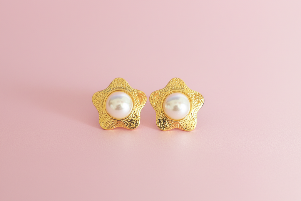 Aretes tipo estrella con Perla Central