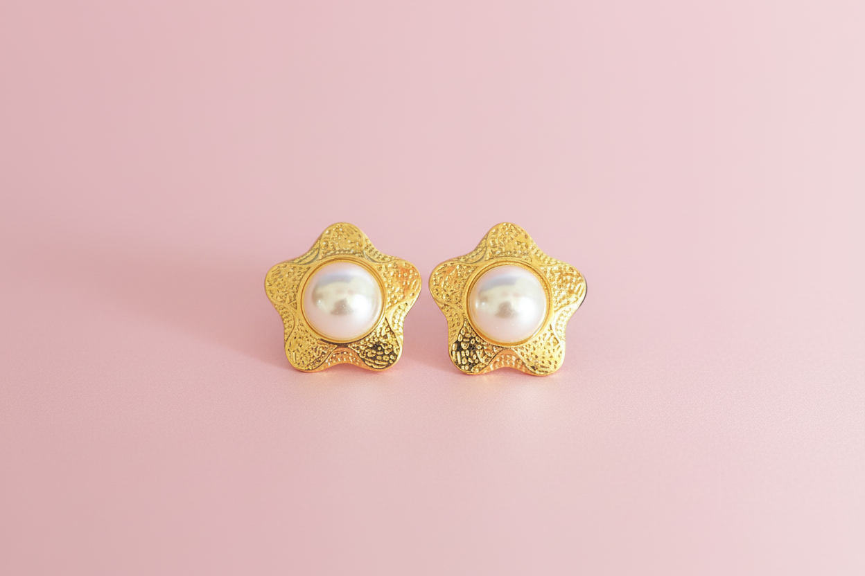 Aretes tipo estrella con Perla Central