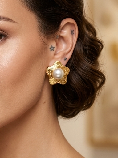 Aretes tipo estrella con Perla Central